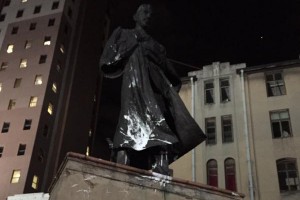 Mohandas Gandhi defaced statue by YusufOmarSA on Twitter