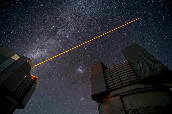 The VLT uses an artificial star to track turbulence in the atmosphere. ESO/G Hüdepohl