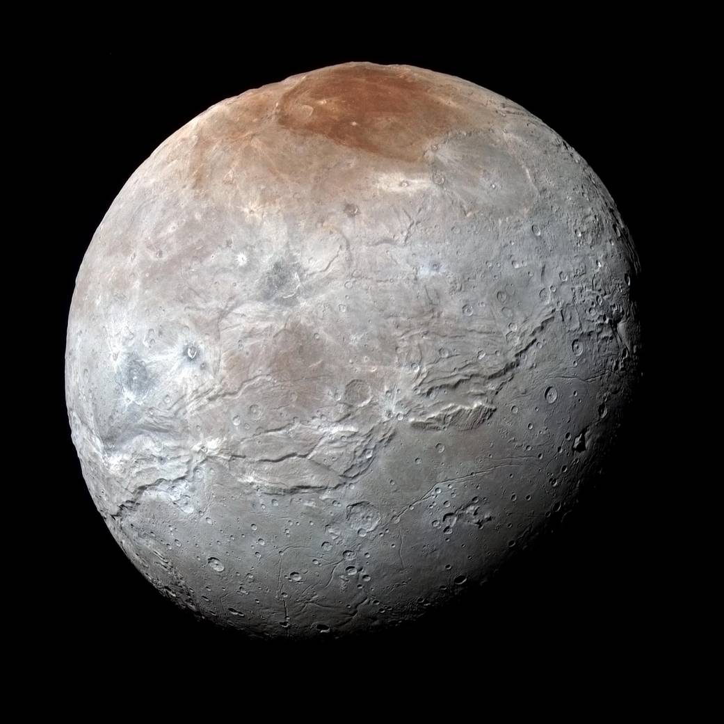 NASA's New Horizons spacecraft captured this high-resolution enhanced color view of Charon just before closest approach on July 14, 2015.