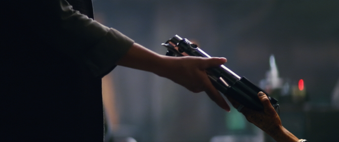Passing the baton. Where the baton is actually a deadly laser weapon. Lucasfilm