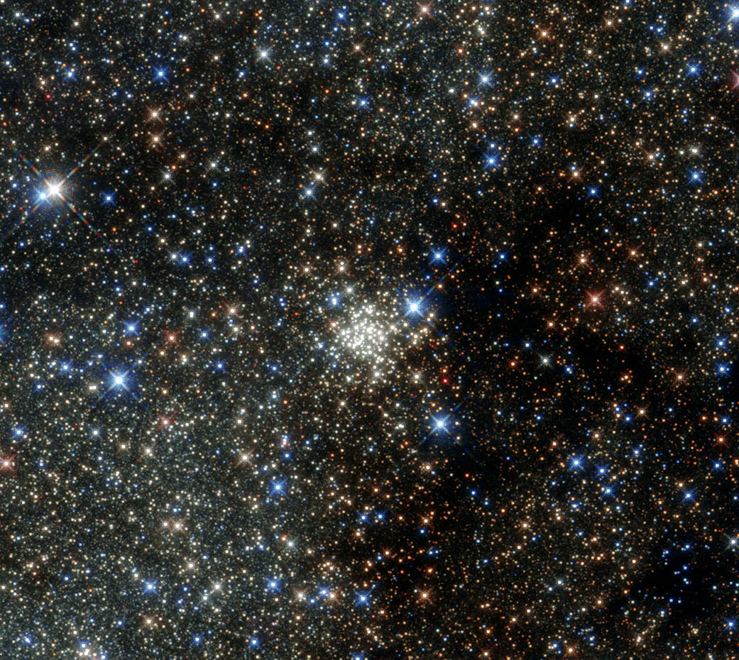 This NASA/ESA Hubble Space Telescope image presents the Arches Cluster, the densest known star cluster in the Milky Way.