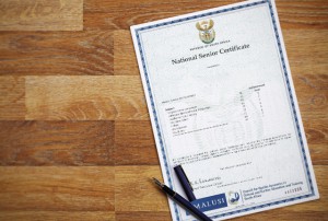 Matric Certificate on table School